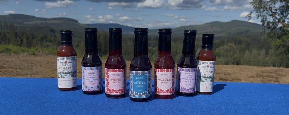 Rose Valley Provisions bottled sauces and syrups sold at the Noodle Palace booth